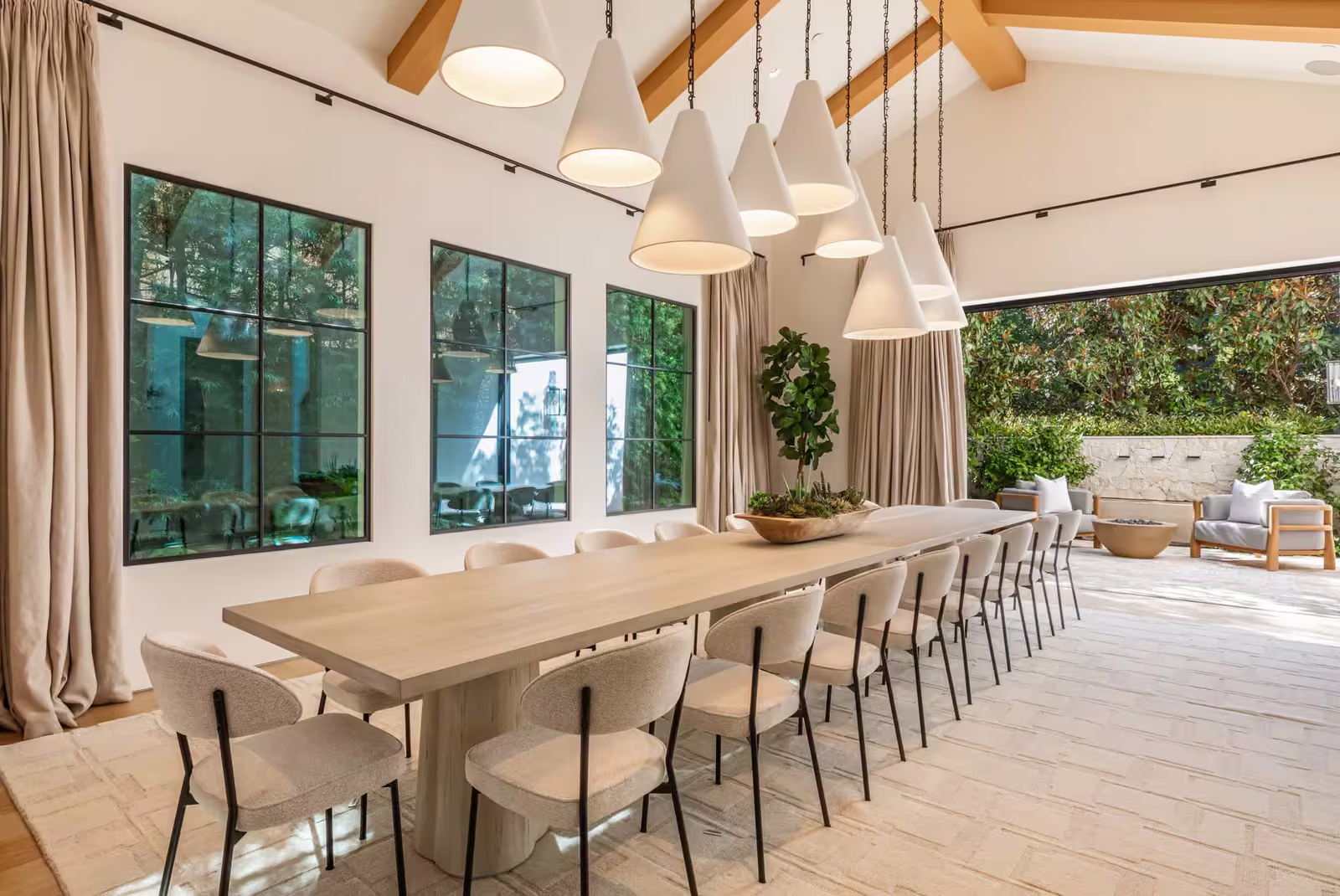 Bella Oceano dining room opening to the patio